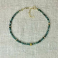 Apatite cut round bracelet w/gold clasp